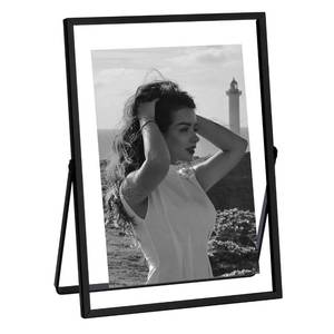 lot 2473 image: eletecpro 5x7 Metal Picture Frame with Real Glass Cover, Tabletop Display Photo for Multiple Size up to 5x7, Black Floating Photo Frame Diaplay 2x3, 3x5, 4x6 for Wedding, Party, Home Decor, Vertical - Retail $14