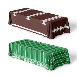 lot 2495 image: Bambluby Football Party Disposable Plastic Tablecloths - Touchdown Table Covers for Birthday Parties, Football Games, and Decorations - 2-Pack, 108 x 54 Inches - Retail $7