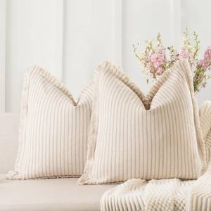 lot 6344 image: ZWJD Throw Pillow Covers 26x26 Set of 2 Striped Pillow Covers with Fringe Chic Cotton Decorative Pillows Square Cushion Covers for Sofa Couch Bed Living Room Farmhouse Decor - Retail $37