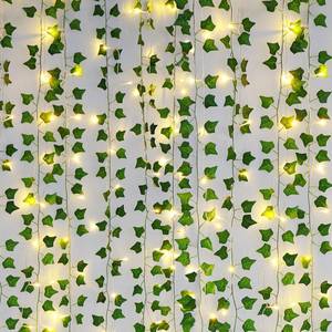 lot 11043 image: Freyalife Fake Vines for Room Decor(12 Pack 84 FT),with CE Certified 80 LED String Lights,Artificial Plant Ivy for Aesthetic Home Bedroom Wall Wedding Party Office Patio Indoor, Outdoor Garden D�cor - Retail $10