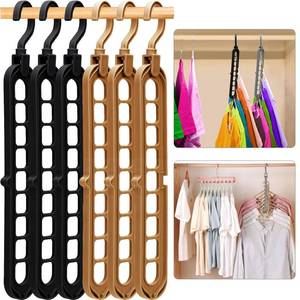 lot 12058 image: Closet Organizers and Storage,College Dorm Room Essentials, Multifunctional Organizer Magic Space Saving Hangers with 9 Holes Storage Organization for Wardrobe Black Gray - Retail $8