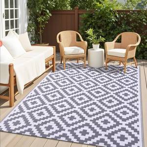 lot 19184 image: OLANLY Waterproof Outdoor Rug 5x8 ft, Outdoor Plastic Straw Rug for Camping, RV Mat Outside, Outdoor Carpet for Porch, Deck, Backyard, Balcony, Picnic, Grey & White - Retail $36