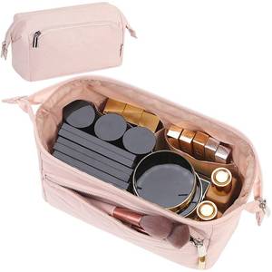 lot 16073 image: NISHEL Travel Makeup Bag for Women with Front Pockets, Large Wide-open Case, Portable Organizer To Hold Travel-Size Accessory Bottles, Cosmetics, Brushes, Skincare Products, Pink - Retail $10