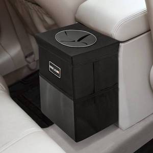 lot 16101 image: Car Trash Can with Lid - Trash Bag Hanging with Storage Pockets Leak-Proof SUV Organizer Collapsible and Portable Waterproof Truck Garbage Bin, 2.6 Gal Large Capacity Multipurpose Trash Bin for Van - Retail $14