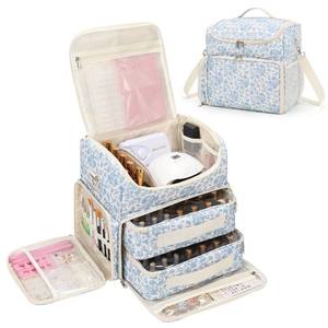 lot 11170 image: CUBETASTIC Extra Large Nail Polish Organizer Case Holds 86 to 100 Bottles Nail Polish and Nail Lamp, Nail Supplies Storage Carrying Bag with 2 Removable Pouches (Blue Floral, 86 Slots) - Retail $60
