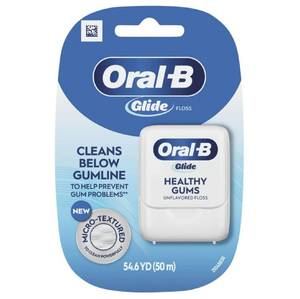 lot 18267 image: Oral-B Glide Healthy gums, unflavored floss 50M (Pack of 6) - Retail $25