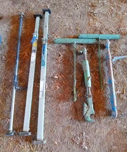 lot 56431 image: Misc Farm Tool Equpiment with Cabinet Jack and 2 Steel Cargo Bars