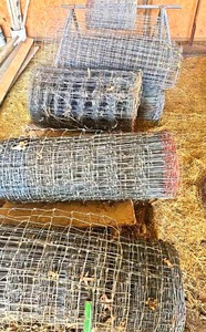 lot 56464 image: Used Galvanized Wire Mesh Fencing Rolls and custom stationary roll holder