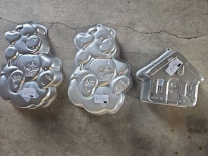 lot 56508 image: Vintage Wilton Cake Pan Set - Care Bear Design and House