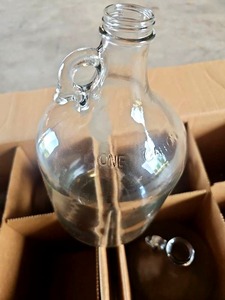 lot 56515 image: Vintage Glass Milk Bottles with Handle
