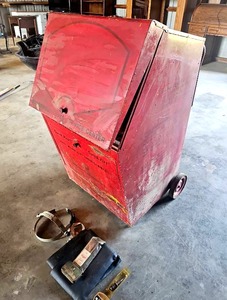 lot 56526 image: Vintage Welding Box, assortment of welding supplies (6011, 7018, etc.) Face Shields, Apron and more (22 x 24 x 36)