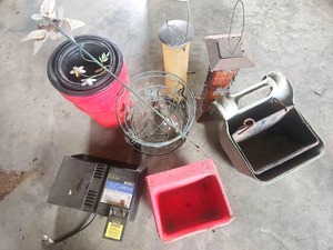 lot 56536 image: Zareba A100LI Electric Fence Controller with Decorative Metal Art, Bird Feeders, Animal Troughs