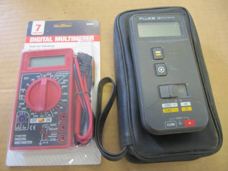 lot 2123 image: 1 New & 1 Used Multi-Meter OHM VOLT (Shop Tools)