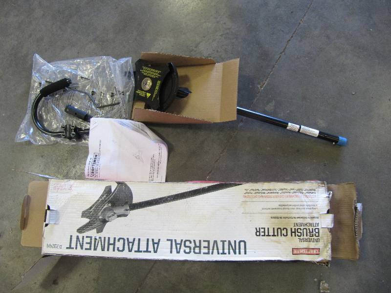 lot 2187 image: NEW IN BOX CRAFTSMAN UNIVERSAL BRUSH CUTTER ATTACHMENT