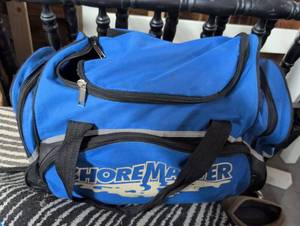 lot 116 image: Vintage Shore Master Blue Duffle Bag mystery contents