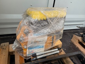 lot 1084 image: Unused Mini Excavator Concrete Breaker Attachment with toolbox and bits