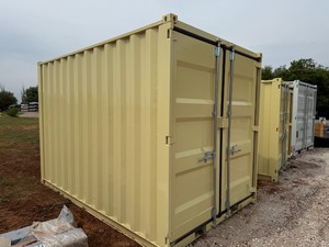 lot 1018 image: Unused 12 foot Container with window and walk through door