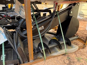 lot 1040 image: Unused Mini Skid Steer Backhoe Attachment