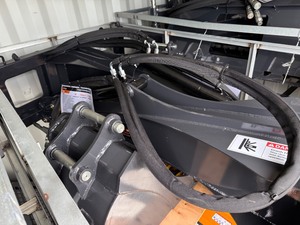 lot 1203 image: Unused Arteer 2025 7 foot Skid Steer Backhoe Attachment