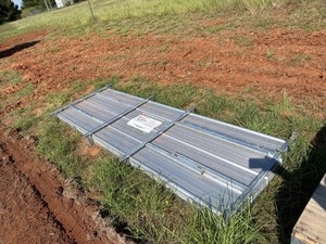 lot 1236 image: 10 feet long Galvalume corrugated Steel Panels  100 panels in Total.  25 Gauge Panels.  41 inch wide by 10 foot long.