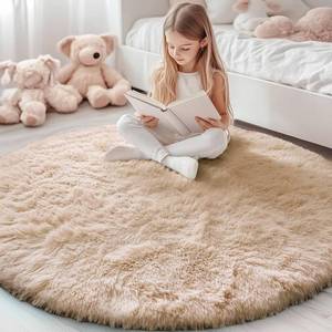 lot 2096 image: OLANLY Beige Round Rugs for Bedroom - Machine Washable, 5 ft Circle Area Rugs for Living Room, Soft and Fluffy Shaggy Carpet for Teen Girls and Boys, Nursery Rooms, Dorms, Home Decor Aesthetic - Retail $40