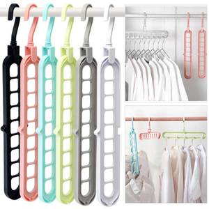 lot 12387 image: HEYHOUSE Closet Organizers and Storage,College Dorm Room Essentials,Pack of 6 Multifunctional Organizer Magic Space Saving Hangers with 9 Holes Storage Organization for Wardrobe Closet - Retail $14