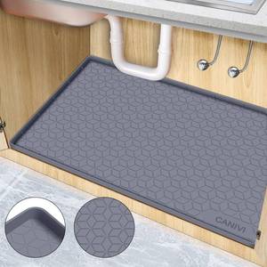 lot 17161 image: CANIVI Under Sink Mat, 34 x 22 Waterproof Silicone Under Sink Tray for Kitchen & Laundry Cabinets, Kitchen Cabinet Shelf Protector, Up to 3.3 Gallons Liquid, Fits 36 inch Standard Cabinet(Grey) - Retail $21