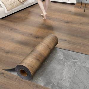 lot 19501 image: Chejiaye Luxury Thicken Wood Grain Peel and Stick Floor Tiles 17.72  x 118Self-Adhesive Vinyl Flooring Roll-DIY Easy for Wall and Floor,Hard SurfaceWaterproofAnti SlipAnti Dent(Brown 14.5 Sq.Ft.) DAMAGED  - Retail $32
