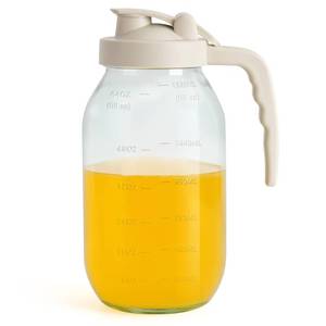 lot 1695 image: YORY 2 Quart Glass Pitcher with Filter Lid Airtight Cold Water Jug for Lemonade Tea Juice Milk Iced Coffee Fruit Drinks Airtight,64 oz - Retail $15