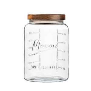 lot 5358 image: Extra Large Mason Jar - 1 Gallon Glass Wide Mouth Jar with Airtight Wooden Lid, Food Storage Container with Measurement Markings For Kitchen Pantry, Pickling, Cookies, Flour & Sugar - Retail $932
