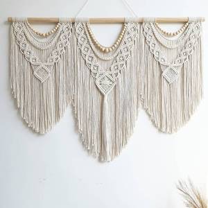 lot 19803 image: guzhiou large macrame wall hanging - Boho Tapestry Macrame Wall Decor Art- Chic Bohemian Handmade Woven Tapestry Home Decoration for Bedroom Living Room Apartment Wedding Party - 43x32 (Wood bead) - Retail $35