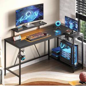 lot 13913 image: Bestier 58 L Shaped Gaming Desk with LED Lights & Power Outlets,Reversible Home Office Corner Desk with Shelves,Larger PC Workstation with Hooks for Studying,Desk for Bedroom,Carbon Fiber Black