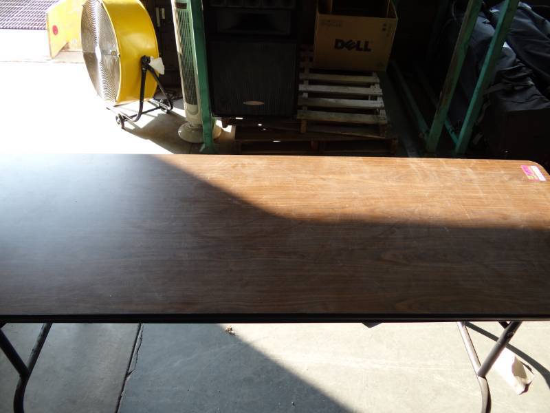 lot 1298 image: Wood Top 72x24 Inch Folding Leg Table
