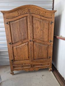 lot 19 image: Southwestern Style Entertainment Center with Adjustable Shelf. Could Easily Be Converted to Wardrobe.