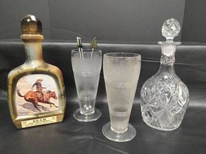 lot 189 image: Vintage Beam Bourbon Decanter with Frederic Remington Artwork and Biographical Information Crystal Decanter and More