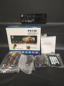 lot 339 image: NIB P5130 4.1-inch Car Multimedia Player with Touchscreen including Instruction Manual and Remote Control