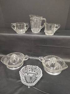 lot 372 image: Vtg Indiana Glass Flat Panel Clear Crystal Sugar and Creamer, Vtg 5 inch Anchor Hocking Pitcher, Three Footed Lead Crystal Candy Dish and 2 Vtg Glass Juicers with Handles