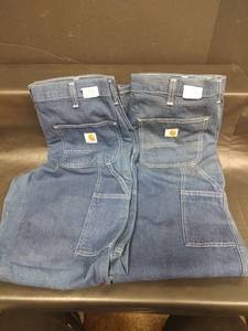 lot 579 image: New Carhartt Dungaree Fit Work Pants 30 x 32, Two Pair