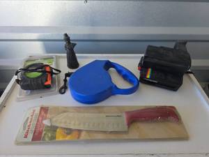 lot 853 image: Polaroid OneStep 600 Rainbow Stripe Camera, Tape Measure, New Kitchen Aid Knife and Dog Leash