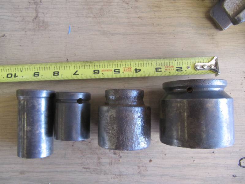 lot 154 image: LOT OF 4 IMPACT SOCKETS SIZES   1 12 , 2 12  , & ( 2)  1  SOCKETS (SHOP TOOLS)