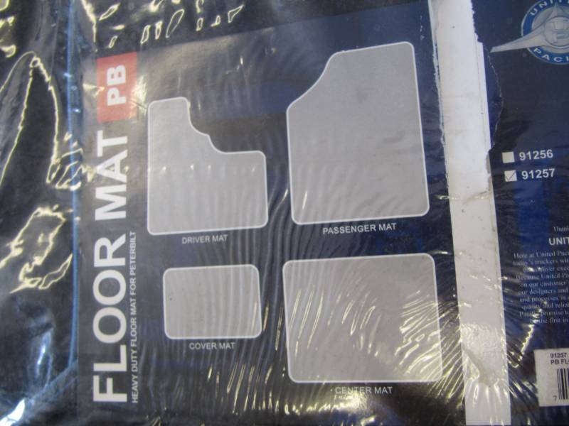 lot 159 image: LOT OF 4 NEW HEAVY DUTY PETERBILT FLOOR MATS
