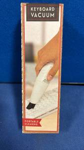 lot 1093 image: Keyboard Vacuum Cleaner with 2 Nozzle Attachments