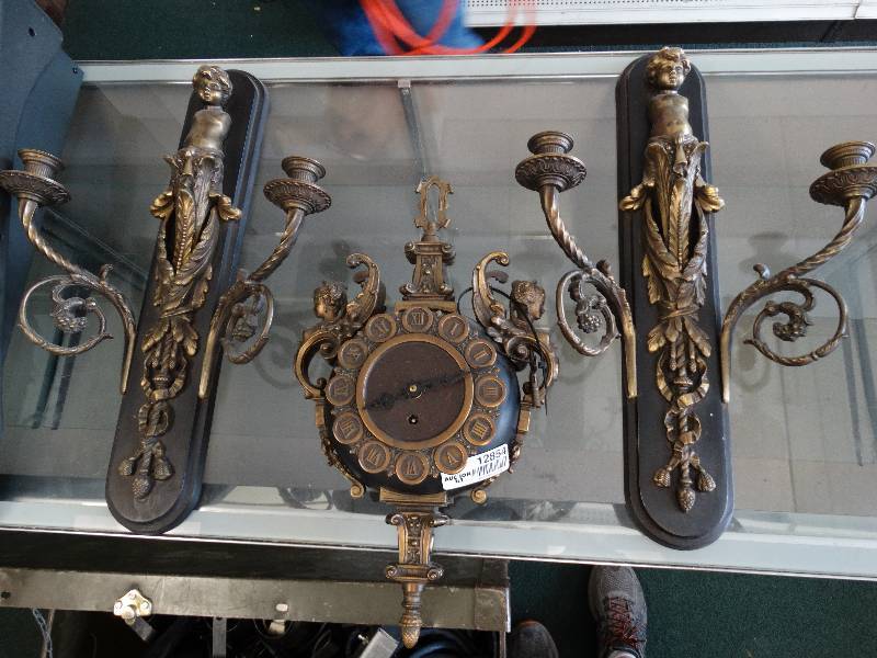 lot 12854 image: Antique brass clock & candle sticks recently fixed runs like new