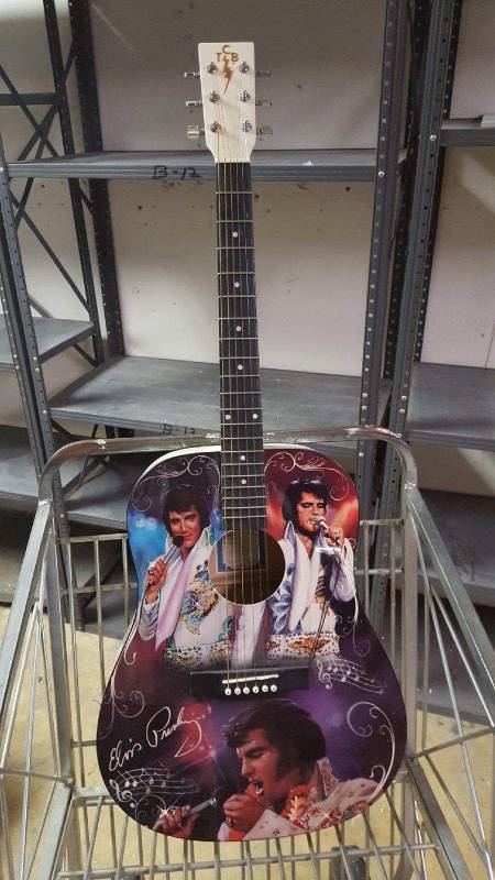 lot 2 image: TCB Elvis Presley guitar