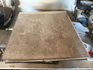 lot 1210 image: ROLL OF INSULATION AND 5- 24X24 VINYL TILES -------------GWW