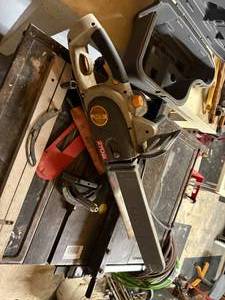 lot 1320 image: RYOBI ELECTRIC CHAIN SAW...................R2