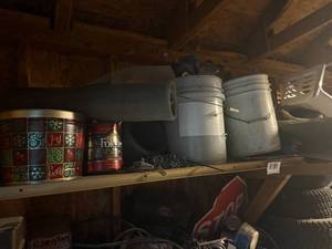 lot 1072 image: SHELF OF MISC  TARP  MISC MOWER PARTS
