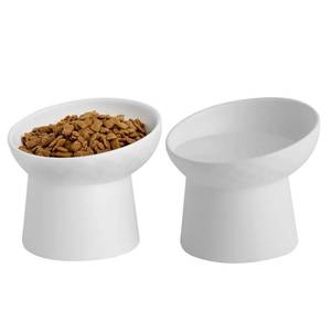 lot 17608 image: KITCHENLESTAR Ceramic Raised Cat Bowls, Elevated Tilted Cat Food and Water Bowls Set, Porcelain Stress Free Pet Feeder Dish for Cats and Small Dogs, Dishwasher and Microwave Safe, Set of 2(White) - Retail $27