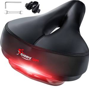 lot 12329 image: Giddy Up Bike Seat - Comfortable Bike Saddle for Exercise and Road Bicycle with LED - Wide Padded Bicycle Saddle for Peloton - Replacement Comfort Bicycle Seat Cushion for Men and Women - Retail $40