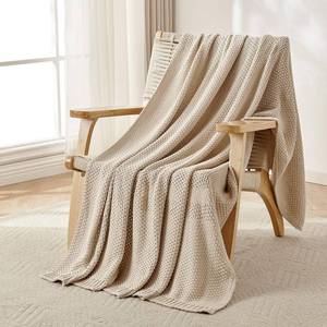 lot 15171 image: Joydeco Chunky Cable Knit Throw Blanket, Lightweight 100% Organic Cotton Soft Cozy Throw Twin Blanket for Couch Bed and Sofa, Rustic Breathable Farmhouse Blanket Gift for Women Men(Beige, 51x63) - Retail $37